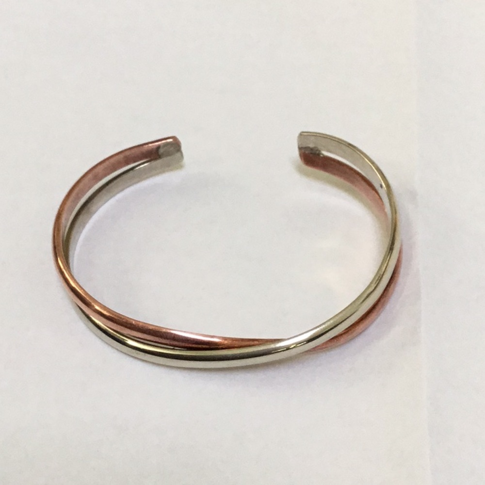 Silver and copper twisted bangle bracelet